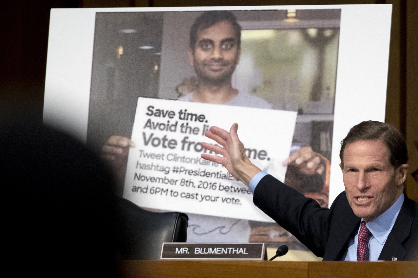 Sen. Richard Blumenthal, D-Conn., speaks next to a poster depicting an online ad that ;attempted to suppress voters'during a Senate Committee hearing on Capitol Hill in Washington, Oct. 31, 2017. (AP/Andrew Harnik)