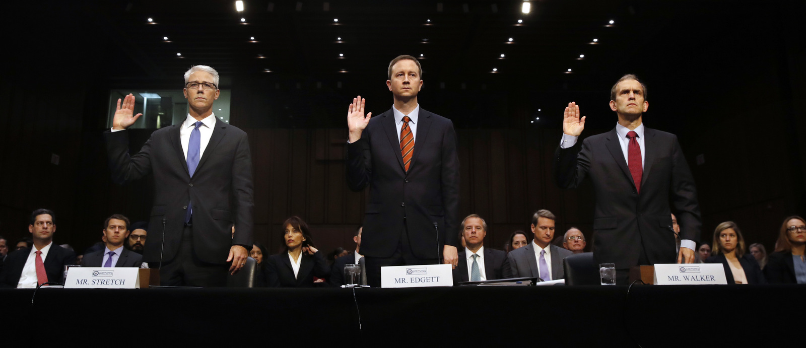 In this Wednesday, Nov. 1, 2017, file photo, from left, Facebook's General Counsel Colin Stretch, Twitter's Acting General Counsel Sean Edgett, and Google's Senior Vice President and General Counsel Kent Walker, are sworn in for a Senate Intelligence Committee hearing on Russian election activity and technology, on Capitol Hill in Washington. (AP/Jacquelyn Martin)