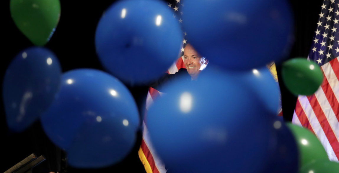 New Jersey gubernatorial nominee Phil Murphy is seen as balloons drop during his election night victory party at the Asbury Park Convention Hall, Nov. 7, 2017, in Asbury Park, N.J. (AP/Julio Cortez)