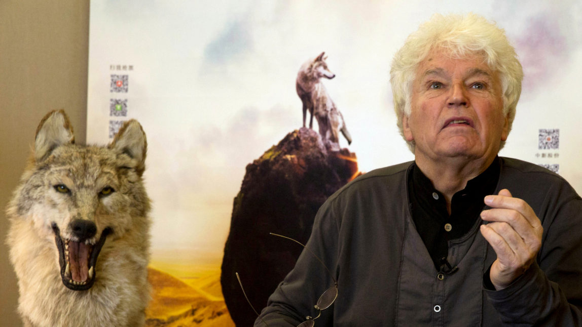 French film director Jean-Jacques Annaud talks about his latest film "Wolf Totem" during an interview in Beijing. As part of the "Paradise Papers" global investigative reporting, French media reported Wednesday Nov. 8 2017 that Annaud used accounts in the Cayman Islands and Hong Kong. Annaud's directing credits include "The Name of the Rose" and "Seven Years in Tibet." (AP/Ng Han Guan)
