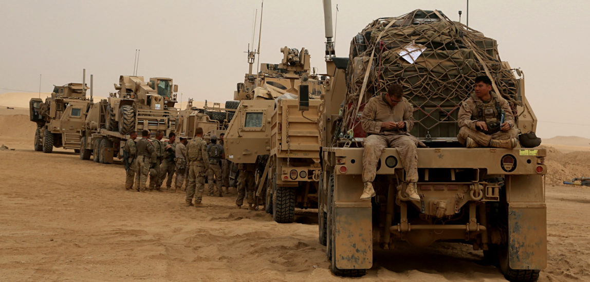 U.S. Marines prepare to build a military site in western Anbar, Iraq. The US' newest outpost is in this dusty corner of western Iraq near the border with Syria where several hundred American Marines operate close to the battlefront. (AP/Khalid Mohammed)