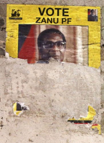 An election poster from the 2008 Zanu Pf election campaign on the wall of a dilapidated old building in the Mbara suburb of Harare, Friday Nov. 17, 2017. Zimbabwe's military says it is making "significant progress" in talks with President Robert Mugabe for his departure while it pursues and arrests some allies of the leader and his wife. (AP Photo)