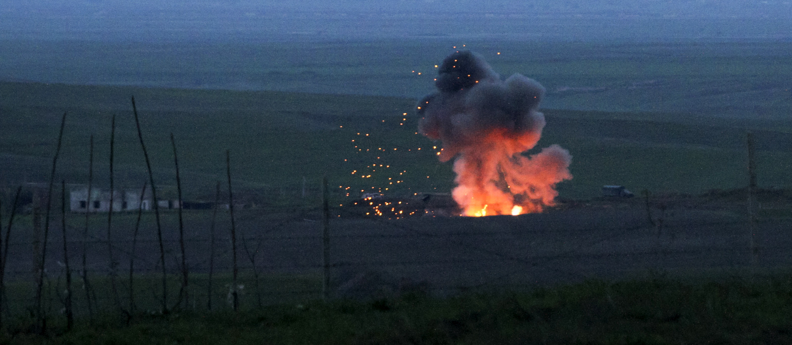 An explosion of a downed Azerbaijani drone in the Nagorno-Karabakh, Azerbaijan, April 4, 2016. The Nagorno-Karabakh military said it downed several Azerbaijani drones since fighting around the region erupted. (Vahram Baghdasaryan/Photolure)