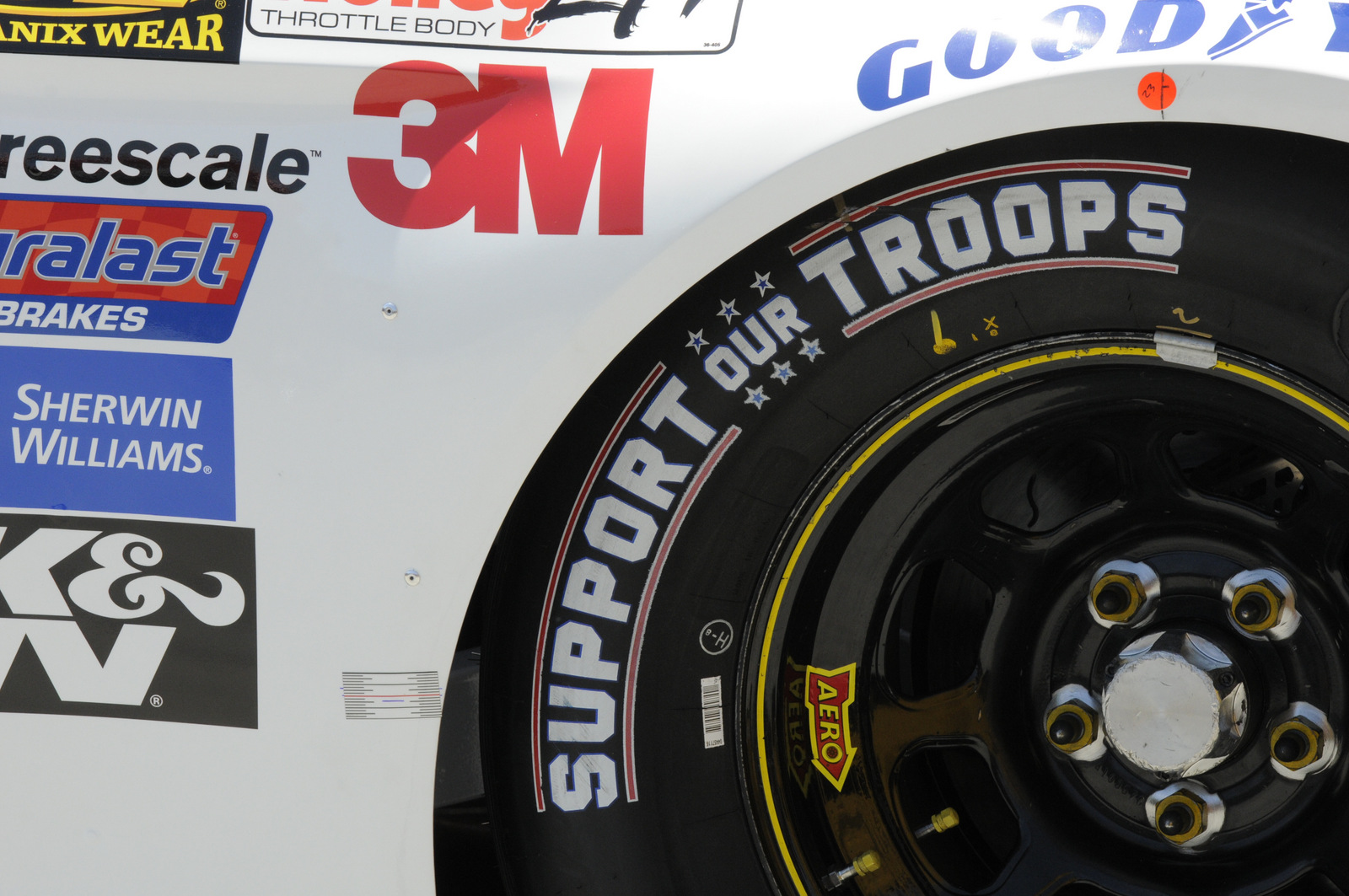 Goodyear racing tires show "Support Our Troops" during practice for Sunday's NASCAR Coca-Cola 600 Sprint Cup series auto race at Charlotte Motor Speedway in Concord, N.C., Thursday, May 21, 2015. (AP/Mike McCarn)