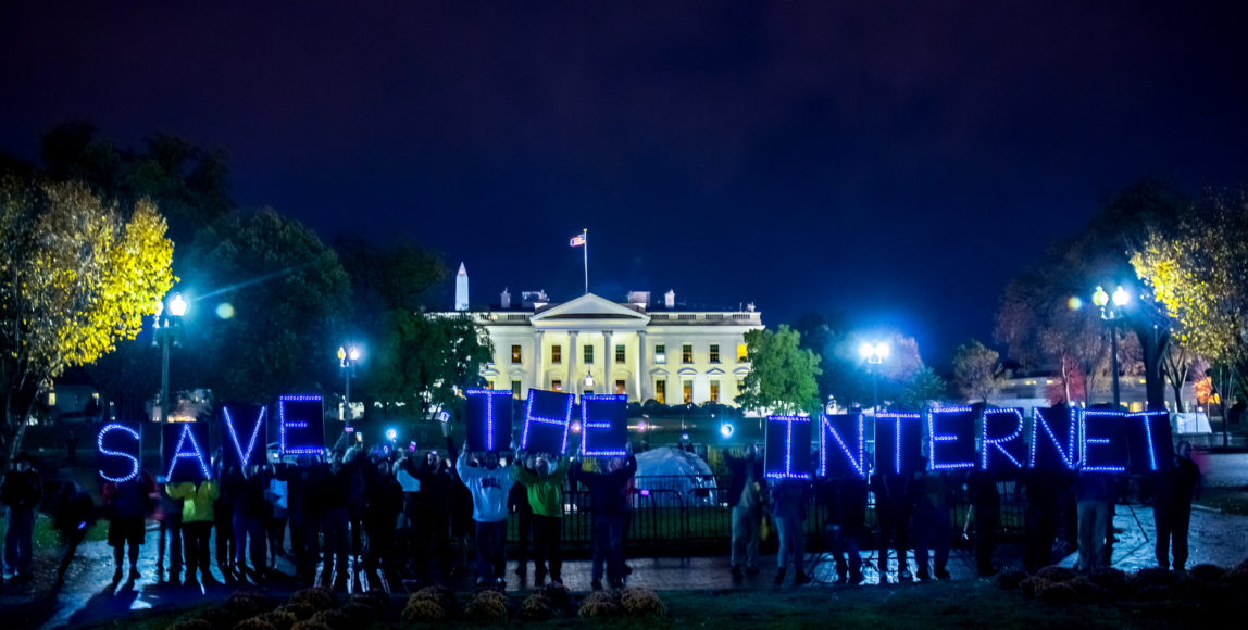 Demonstrators protest in front of the White House in support of net neutrality. 2014. (Joseph Gruber, Flickr Creative Commons)