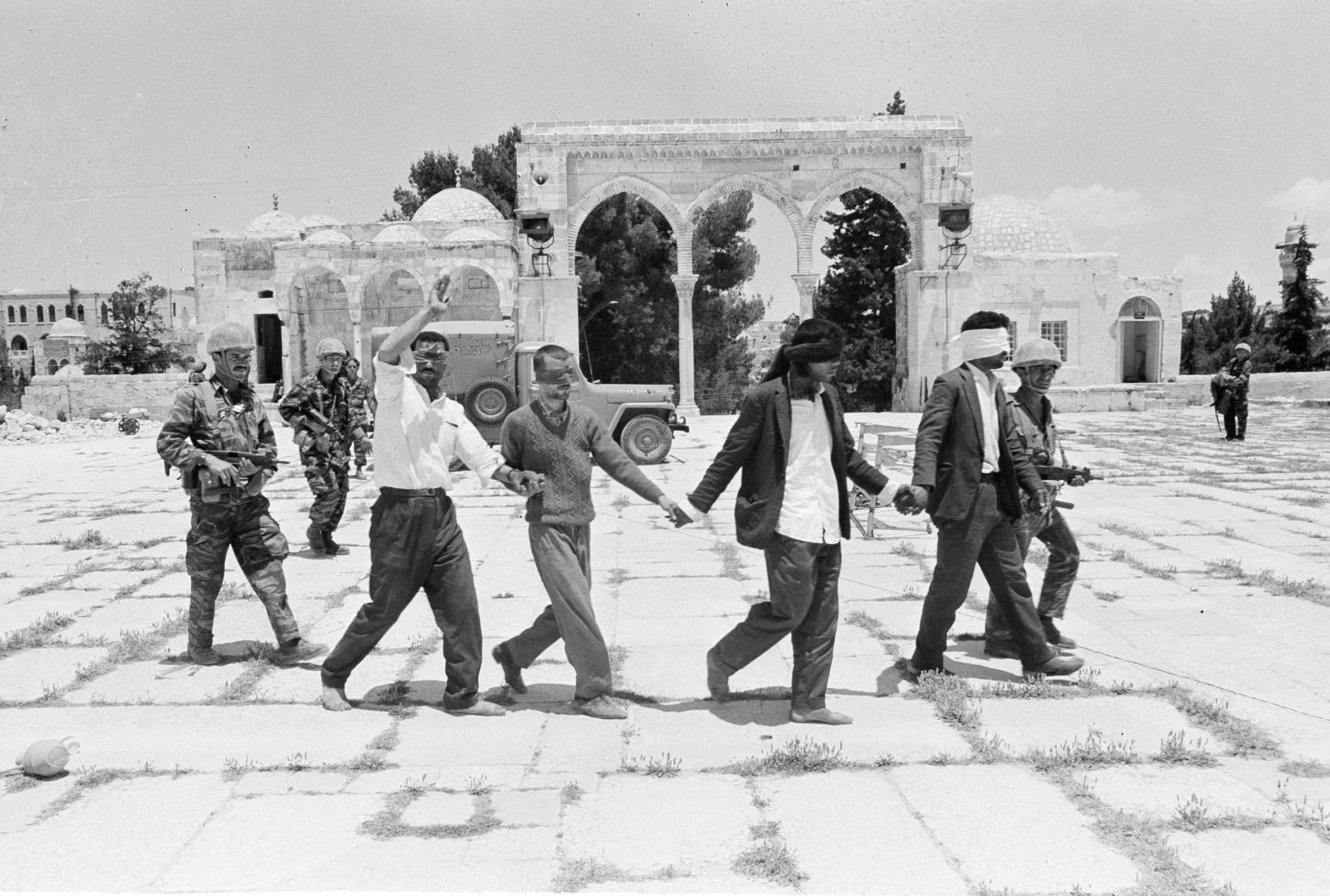 Arabs are led blindfolded to interrogation by Israeli soldiers in the old city of Jerusalem, June 8, 1967. (AP Photo)