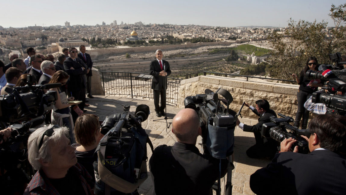 Chile's President Sebastian Pinera, speaks to journalists on the mount of olives overlooking Jerusalem's Old city, March 4 , 2011. (AP/Sebastian Scheiner)
