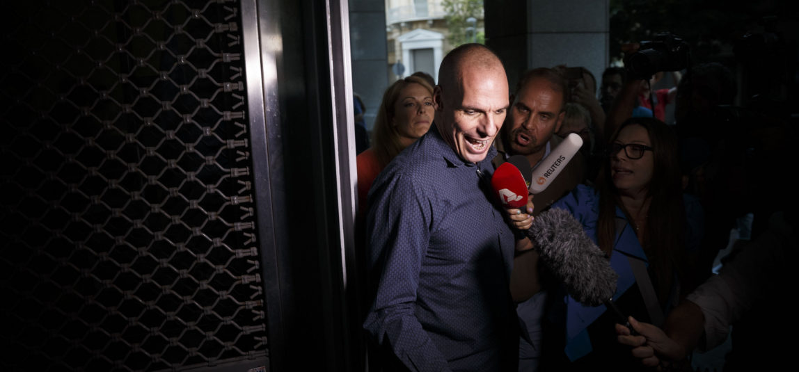 Greece's Finance Minister Yanis Varoufakis answers questions as he leaves his office in Athens, July 1, 2015. (AP/Daniel Ochoa de Olza)