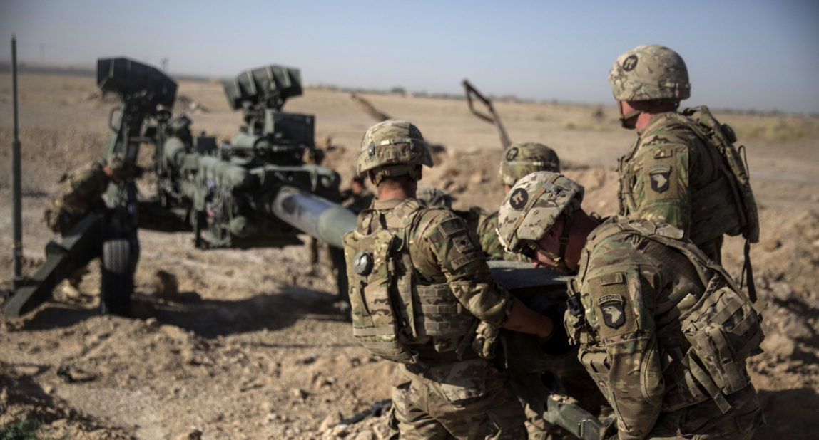 U.S. Soldiers with Task Force Iron maneuver an M-777 howitzer, so it can be towed into position at Bost Airfield, Afghanistan. Reversing his past calls for a speedy exit, U.S. President Donald Trump recommitted the United States to the 16-year-old war in Afghanistan, declaring U.S. troops must "fight to win." He pointedly declined to disclose how many more troops will be dispatched to wage America's longest war. (U.S. Marine Corps photo by Sgt. Justin T. Updegraff, Operation Resolute Support via AP)