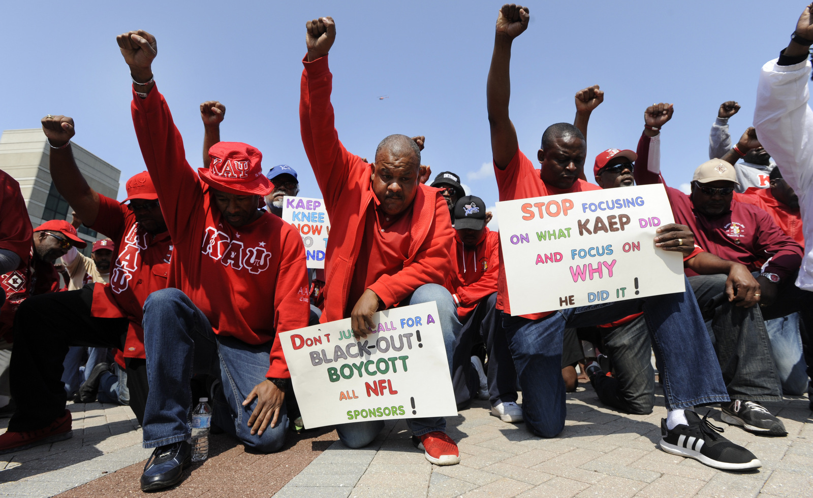 Protesters rally for former quarterback Colin Kaepernick outside Ford Field and an NFL football game between the Detroit Lions and the Arizona Cardinals in Detroit, Sept. 10, 2017. (AP/Jose Juarez)