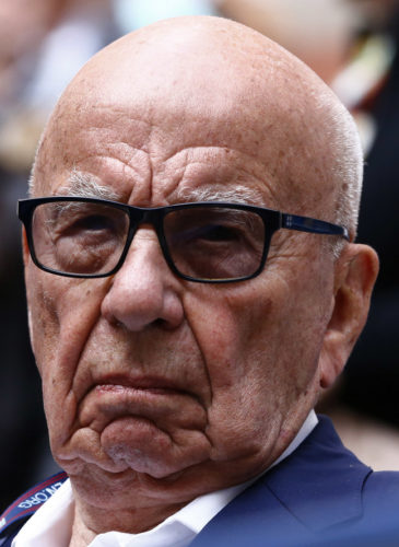 FILE- In this Sunday, Sept. 10, 2017 file photo, Rupert Murdoch waits for the start of the men's singles final of the U.S. Open tennis tournament in New York. (AP/Julio Cortez)
