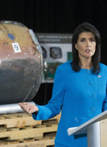 U.S. Ambassador to the U.N. Nikki Haley speaks in front recovered segments of a rocket the U.S. and Saudi Arabia allege came from Iran during a press briefing at Joint Base Anacostia-Bolling, Dec. 14, 2017, in Washington. (AP/Cliff Owen)