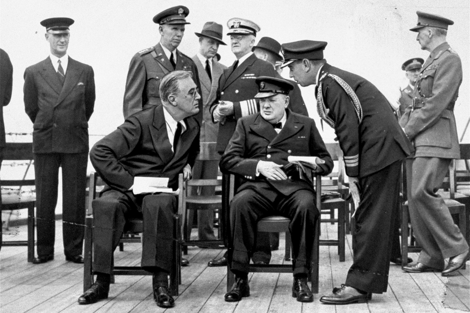 President Franklin D. Roosevelt and Prime Minister Winston Churchill aboard the HMS Prince of Wales, August 14, 1941, working on the principles of fair dealing that became The Atlantic Charter. (AP Photo)