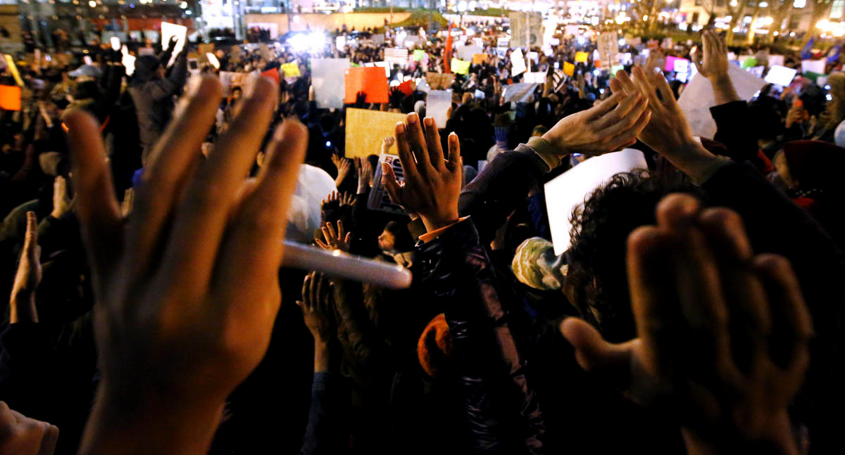 Protesters rally against a grand jury's decision not to indict the police officer involved in the death of Eric Garner in Foley Square, Dec. 4, 2014, in New York. (AP Photo)