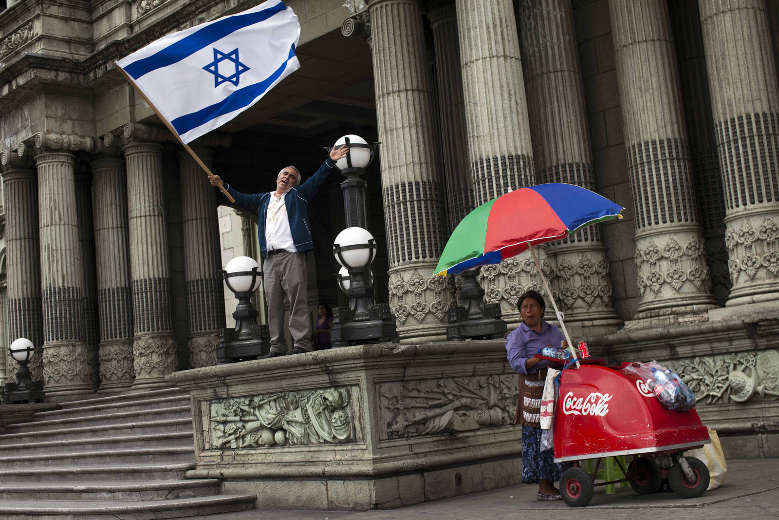 A man waves an Israeli flag during a protest against Guatemala's President Alvaro Colom decision of supporting the creation of a Palestinian state, in Guatemala City, Monday, Oct. 3, 2011. (AP/Rodrigo Abd)