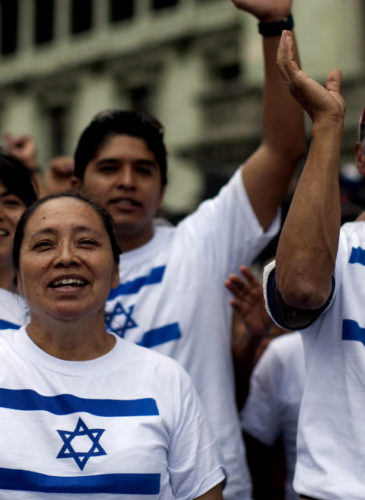 People wearing T-shirts with the Israeli flag demonstrate during a protest against Guatemala's President Alvaro Colom decision of supporting the creation of a Palestinian state, Guatemala City, Oct. 3, 2011. (AP/Rodrigo Abd)