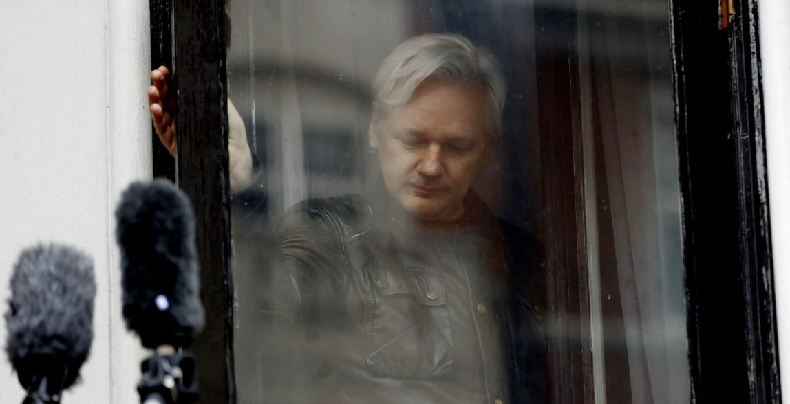 WikiLeaks founder Julian Assange leaves after greeting supporters outside the Ecuadorian embassy in London, May 19, 2017 (AP/Frank Augstein)
