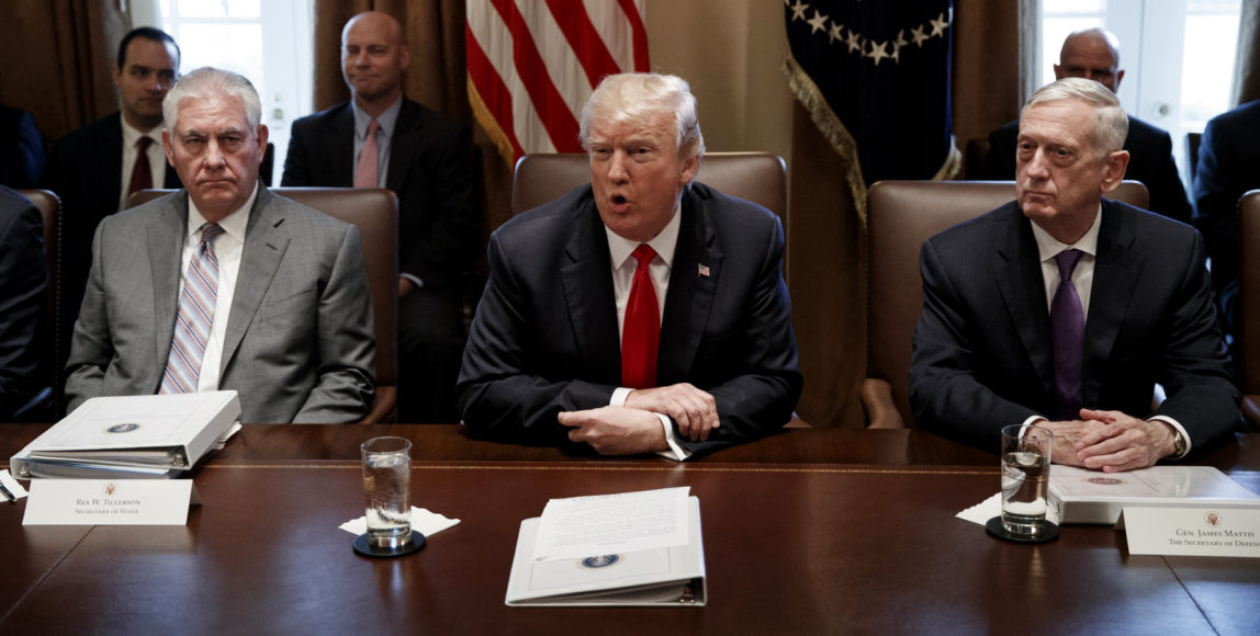 Secretary of State Rex Tillerson, left, and Secretary of Defense Jim Mattis, right, listen as President Donald Trump speaks during a cabinet meeting at the White House, Jan. 10, 2018, in Washington. (AP/Evan Vucci)