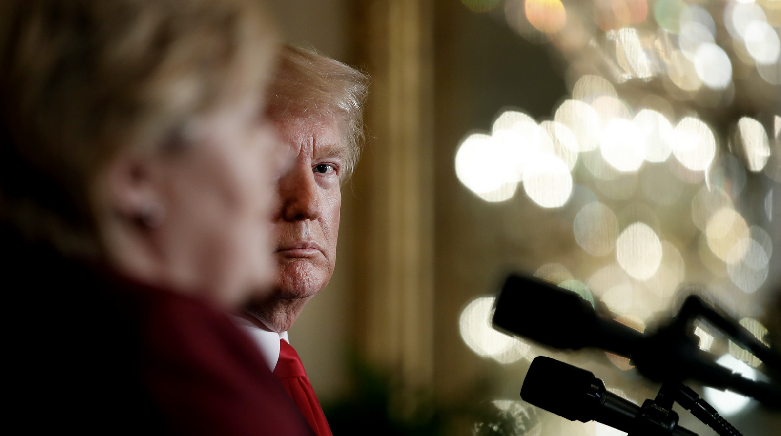 President Donald Trump looks towards Norway's Prime Minister Erna Solberg as she speaks during a news conference in the East Room of the White House, Jan. 10, 2018. (AP/Carolyn Kaster)