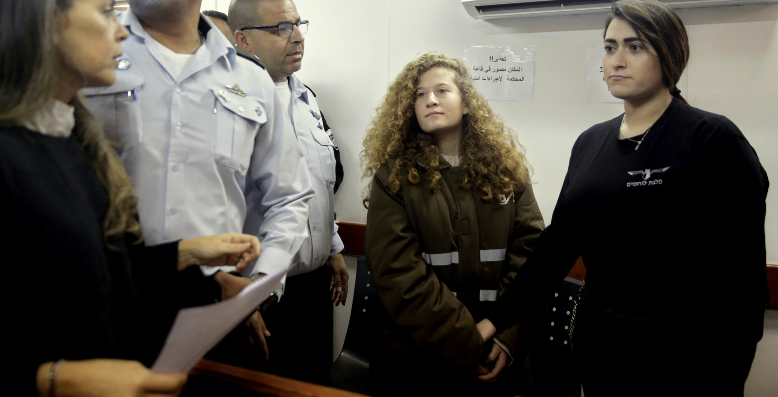 Ahed Tamimi is brought to a courtroom inside the Ofer military prison near occupied Jerusalem, Jan. 15, 2018. (AP/Mahmoud Illean)