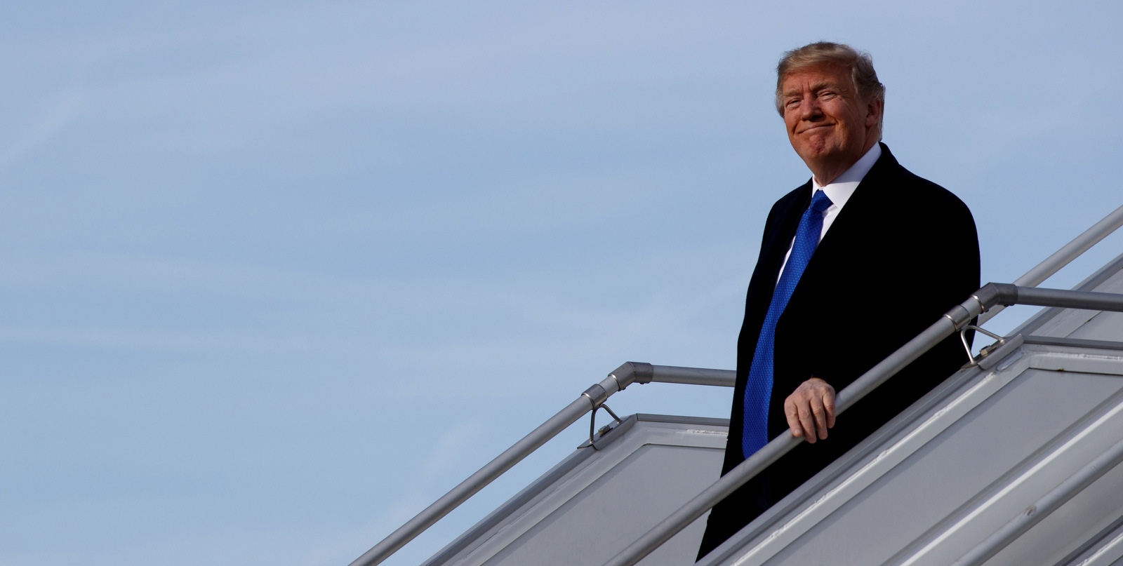President Donald Trump steps off Air Force One after arriving at Zurich International Airport for the World Economic Forum, Jan. 25, 2018, in Zurich, Switzerland. (AP/Evan Vucci)