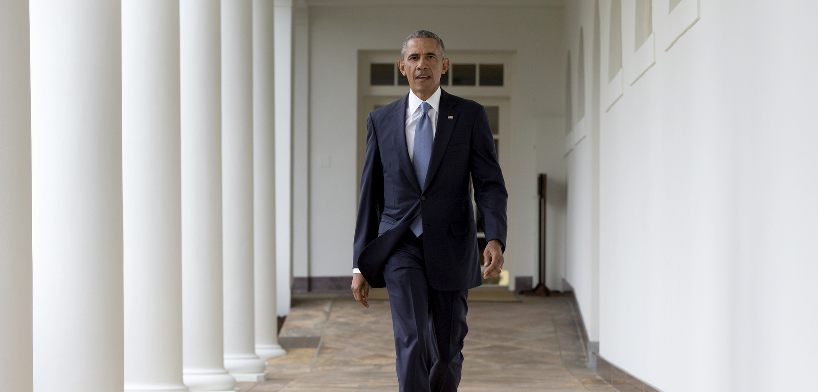 President Barack Obama walks along the colonnade of the White House in Washington, Jan. 12, 2016, to the residence from the Oval Office, hours before giving his State Of The Union address. (AP/Carolyn Kaster)