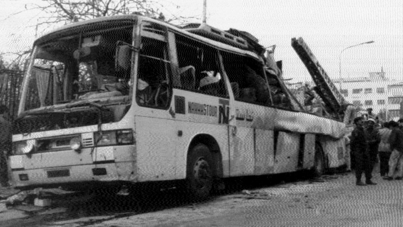 Blood stains surround the place where a bomb exploded on a bus in the Syrian capital of Damascus on Dec 31 1996 blowing off its roof and windows. Syrian authorities announced that nine people were killed and 44 wounded among them 11 from the same family, in the blast which they blame on the Israeli Mossad. (AP/Syrian Arab News Agency )