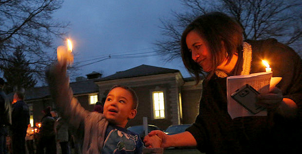 Sarah Muir and her adopted son celebrate at a 2016 Martin Luther King Day event in Titusville. (Ashleigh English/YWCA Titusville)
