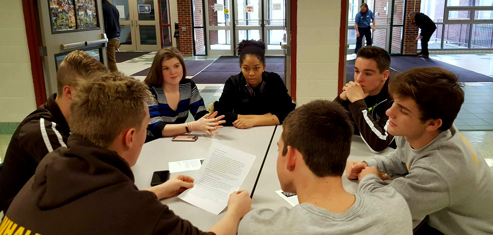 A University of Pittsburgh-Titusville student talks to local high school students during a Martin Luther King Jr. Day event, 2016. (Ashleigh English/YWCA Titusville)