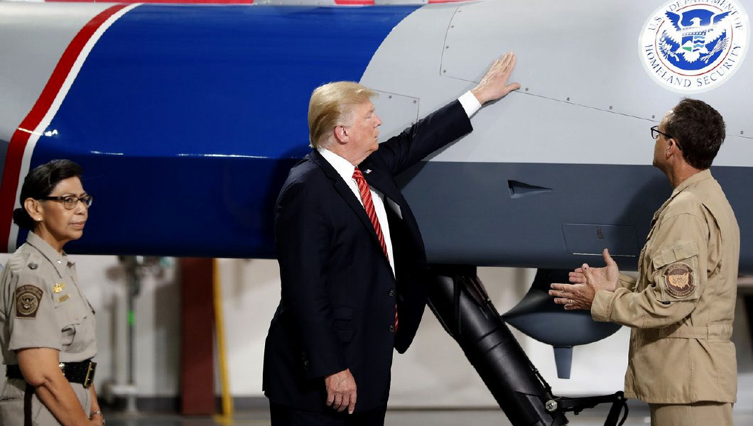 Whitney Webb , President Donald Trump touches a drone during a tour of U.S. Customs and Border Protection Border equipment at their airport hanger at Marine Corps Air Station Yuma in Yuma, Ariz. , President Donald Trump touches a drone during a tour of U.S. Customs and Border Protection Border equipment at their airport hanger at Marine Corps Air Station Yuma in Yuma, Ariz. , President Donald Trump touches a drone during a tour of U.S. Customs and Border Protection Border equipment at their airport hanger at Marine Corps Air Station Yuma in Yuma, Ariz. (AP/Alex Brandon