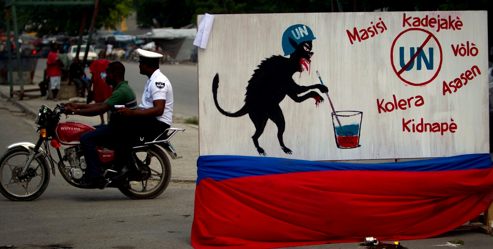 A sign in Haiti depicts a United Nations Peacekeeper in the form of a monster. (Photo: Ramon Espinosa/AP)