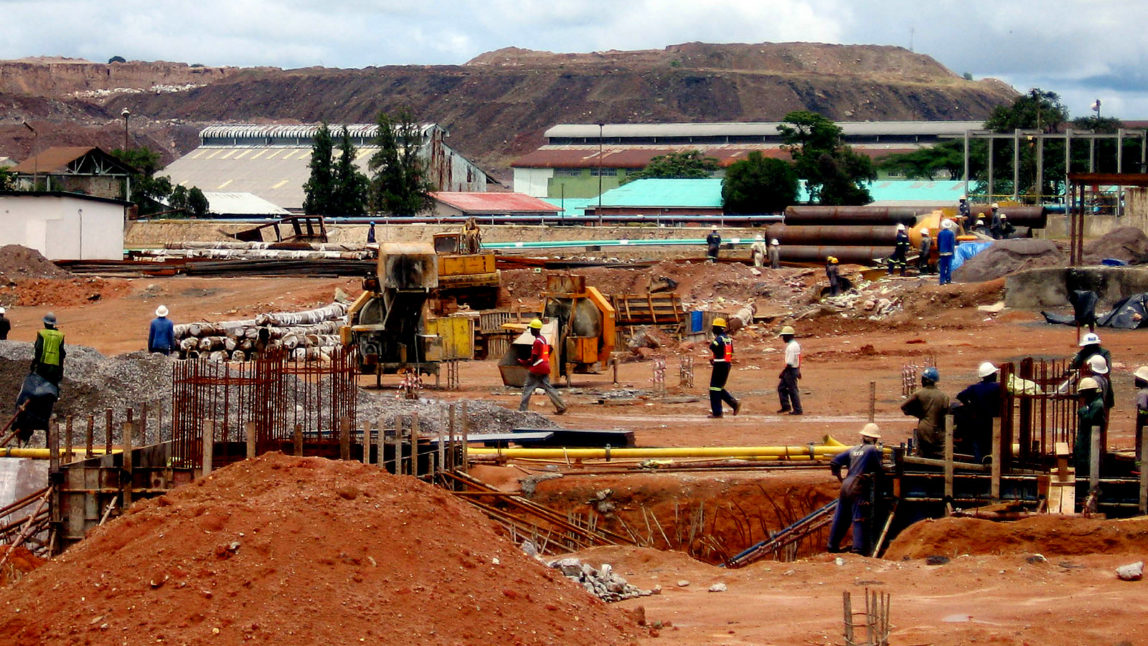 Zambian workers construct a $300 million copper smelter in Chingola, Zambia, Dec. 13, 2006. (AP/Joseph Schatz, File)