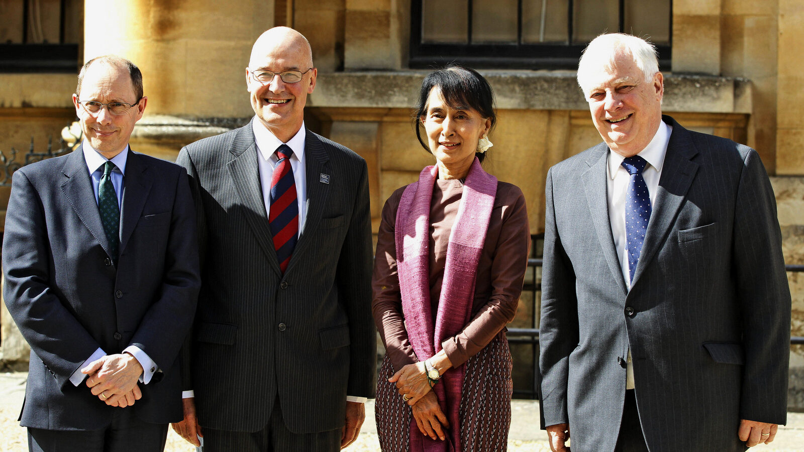 Aung San Suu Kyi when she was a Burmese pro-democracy campaigner walking with Andrew Dilnot, the Principal of St Hugh's College of the Oxford University, at a reception in Oxford in June 2012. (AP/Lefteris Pitarakis)