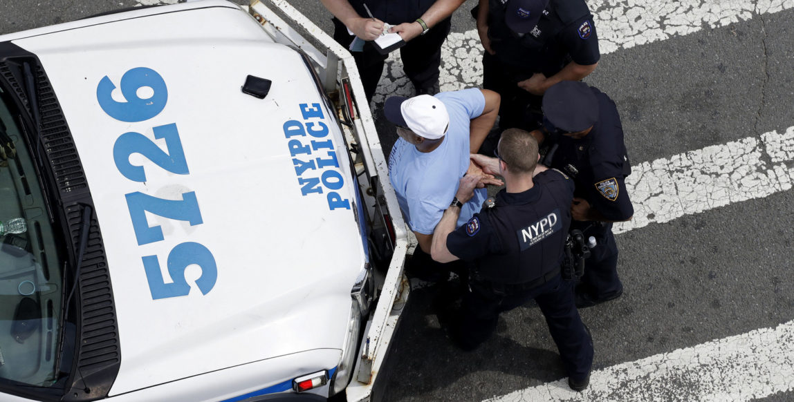 New York City police officers detain and question a man,, July 11, 2017, in the Bronx borough of New York. (AP/Mark Lennihan)