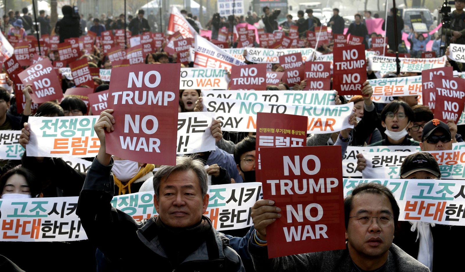 Protesters stage a rally to oppose the visit by U.S. President Donald Trump in front of the National Assembly in Seoul, South Korea, Nov. 8, 2017. (AP/Ahn Young-joon)