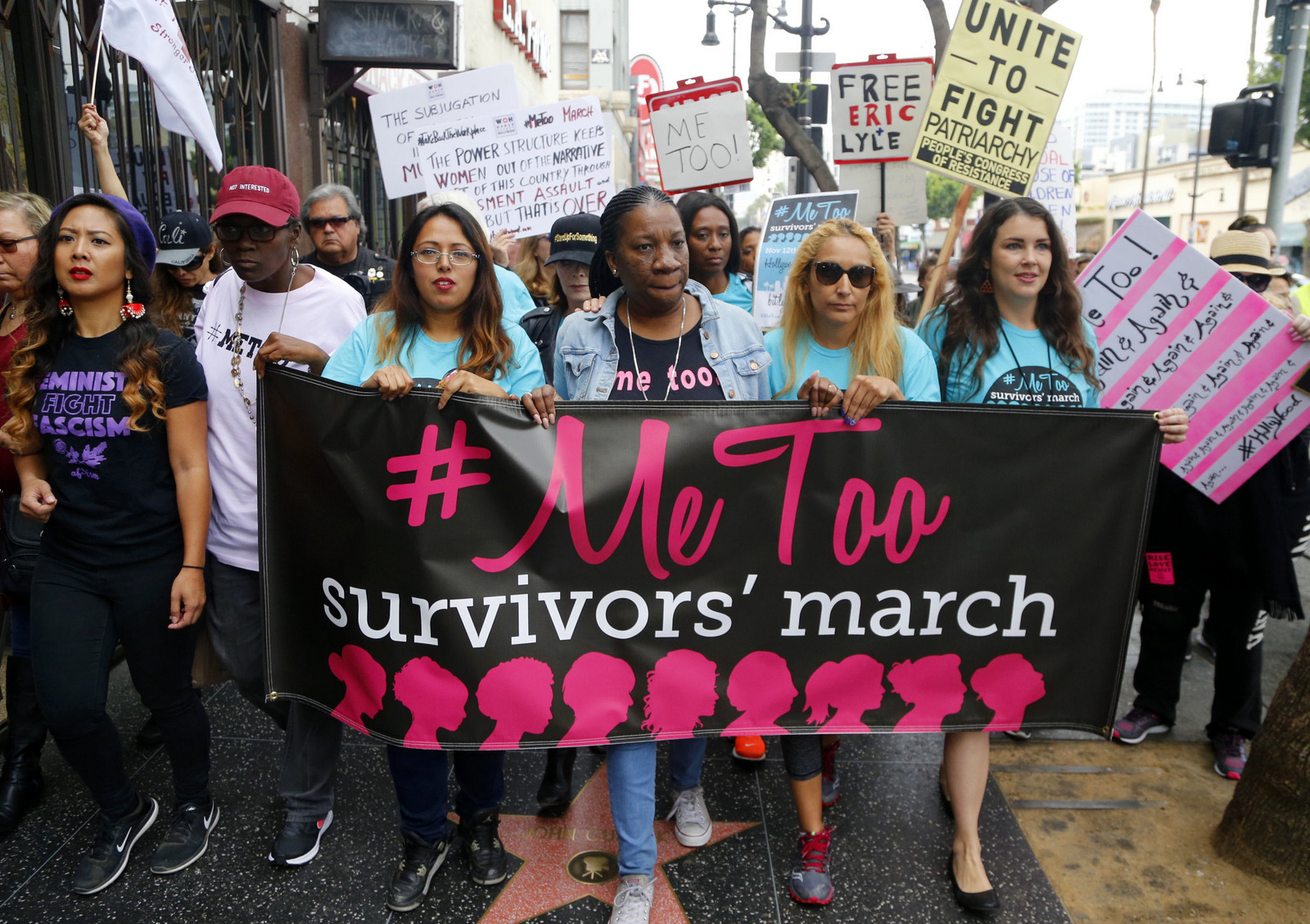 Participants march against sexual assault and harassment at the #MeToo March in Los Angeles on, Nov. 12, 2017. (AP/Damian Dovarganes)