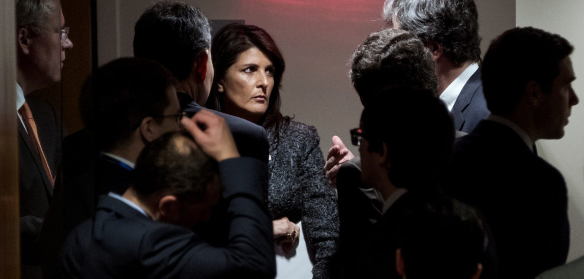 U.S. Ambassador to the United Nations Nikki Haley, center, confers with members of the United Nations Security Council just outside the chamber before a scheduled vote on a resolution, Feb. 24, 2018, demanding a 30-day humanitarian cease-fire across Syria. (AP/Craig Ruttle)