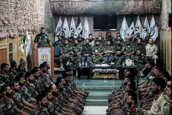A graduation ceremony is held at the Jaish al-Islam Military Academy, at an undisclosed location, in the rebel-held Eastern Ghouta, Syria, on Jan. 16. Jaish al-Islam is the most prominent of the numerous fighting forces operating in Eastern Ghouta (Photo: Mohammed Badra/EPA)