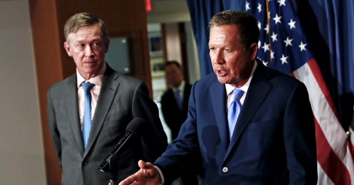 Ohio Gov. John Kasich, right, joined by Colorado Gov. John Hickenlooper, left, speaks during a news conference at the National Press Club in Washington, June 27, 2017. (AP/Carolyn Kaster)