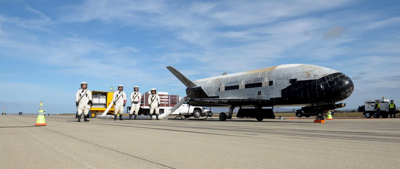 One of the U.S. Air Force's robotic X-37B space planes is seen on the runway after landing itself following a classified mission.
