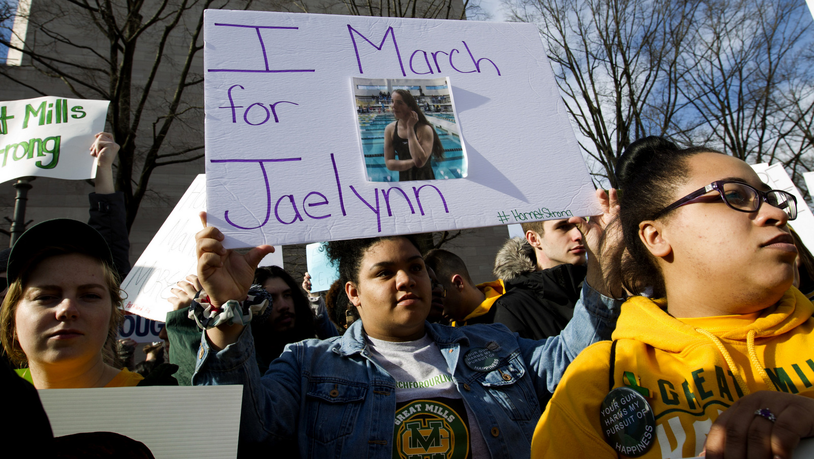 Ayanne Johnson, a student from Great Mills High School in southern Maryland holds up the photograph of her classmate Jaelynn Willey during the "March for Our Lives" rally in support of gun control in Washington, March 24, 2018. Willey was killed by a classmate this week at the school in southern Maryland. (AP/Jose Luis Magana)