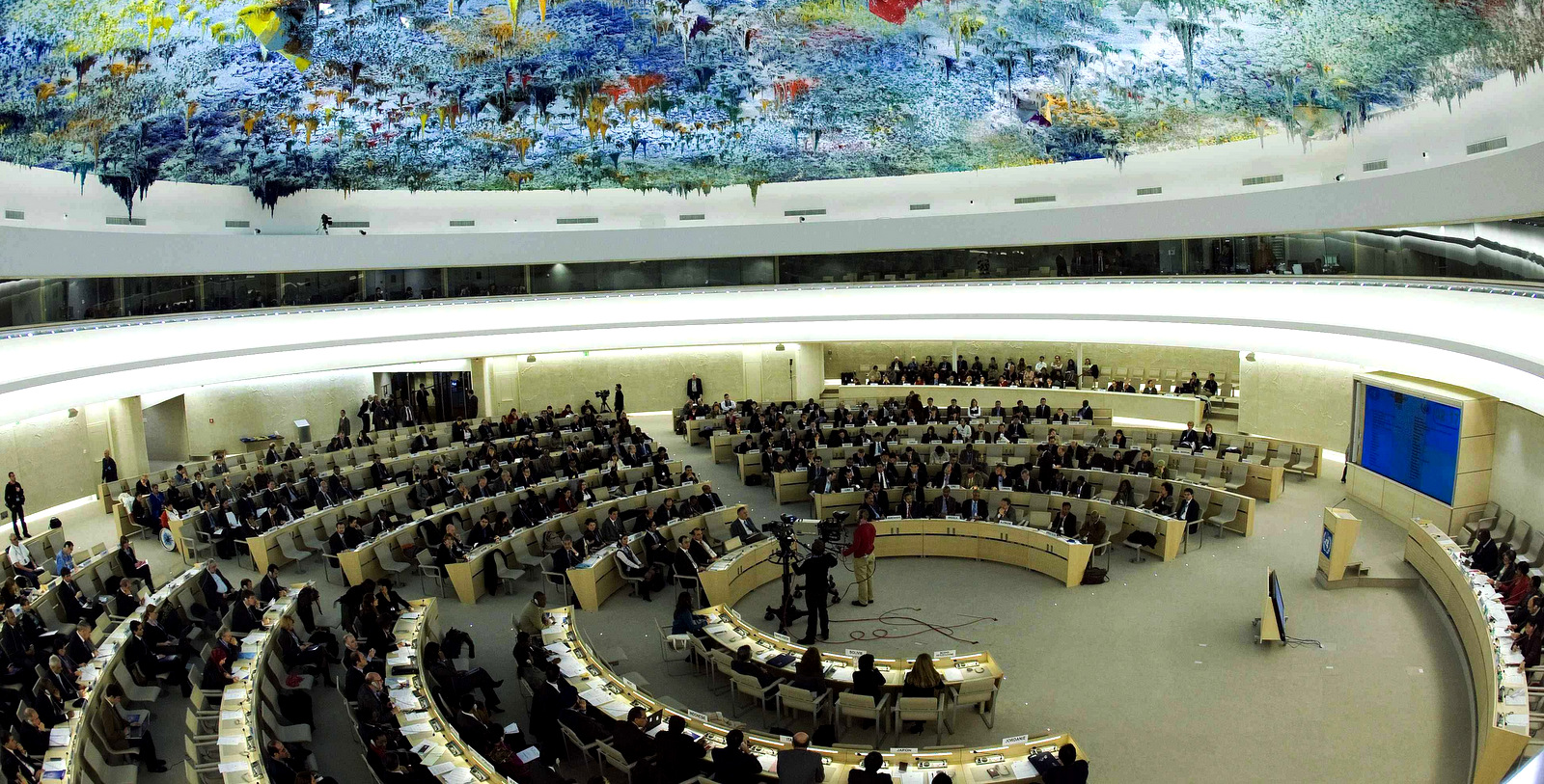 A general view of the assembly hall during the opening of the Human Rights Council's Commemorative session marking the 60th anniversary of the adoption of the Universal Declaration of Human Rights, at the European headquarters of the United Nations in Geneva, Switzerland, Friday Dec. 12, 2008. (AP/Keystone, Salvatore Di Nolfi)