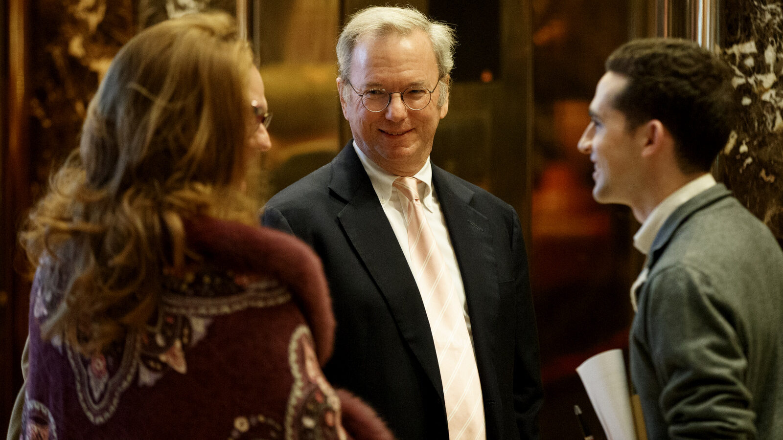 Eric Schmidt, executive chairman of Alphabet, Inc., stands in the lobby of Trump Tower in New York, Jan. 12, 2017. (AP/Evan Vucci)