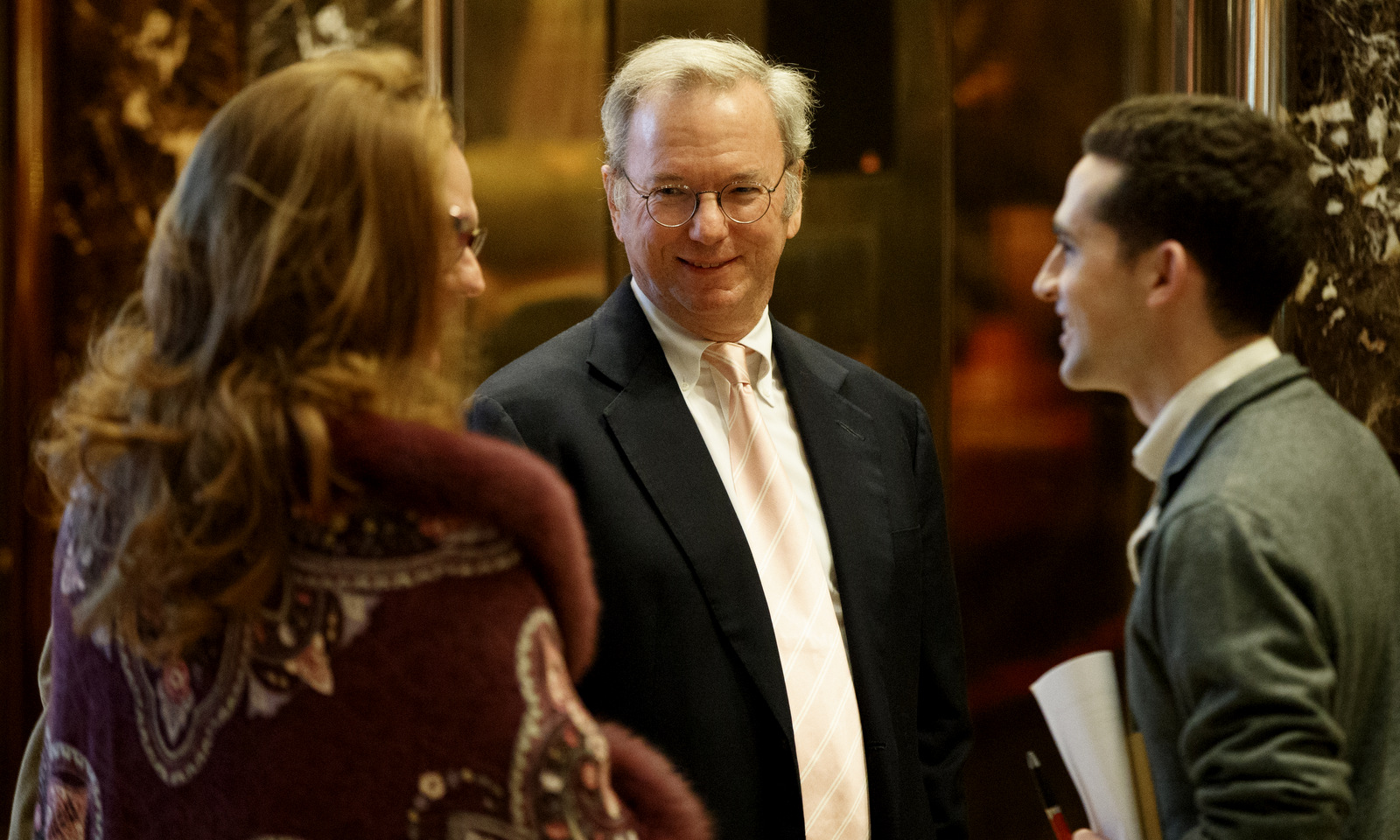 Eric Schmidt, executive chairman of Alphabet, Inc., stands in the lobby of Trump Tower in New York, Jan. 12, 2017. (AP/Evan Vucci)