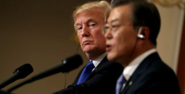 President Donald Trump, left, listens to South Korean President Moon Jae-in during a joint news conference at the Blue House in Seoul, South Korea, Nov. 7, 2017. President Donald Trump, on his first day on the Korean peninsula, signaled a willingness to negotiate with North Korea to end its nuclear weapons program, urging Pyongyang to "come to the table" and "make a deal." (AP/Andrew Harnik)