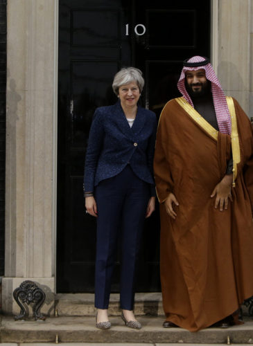 Britain's Prime Minister Theresa May looks to the media as she greets Saudi Arabia's Crown Prince Mohammed bin Salman outside 10 Downing Street in London, Wednesday, March 7, 2018. (AP/Alastair Grant)