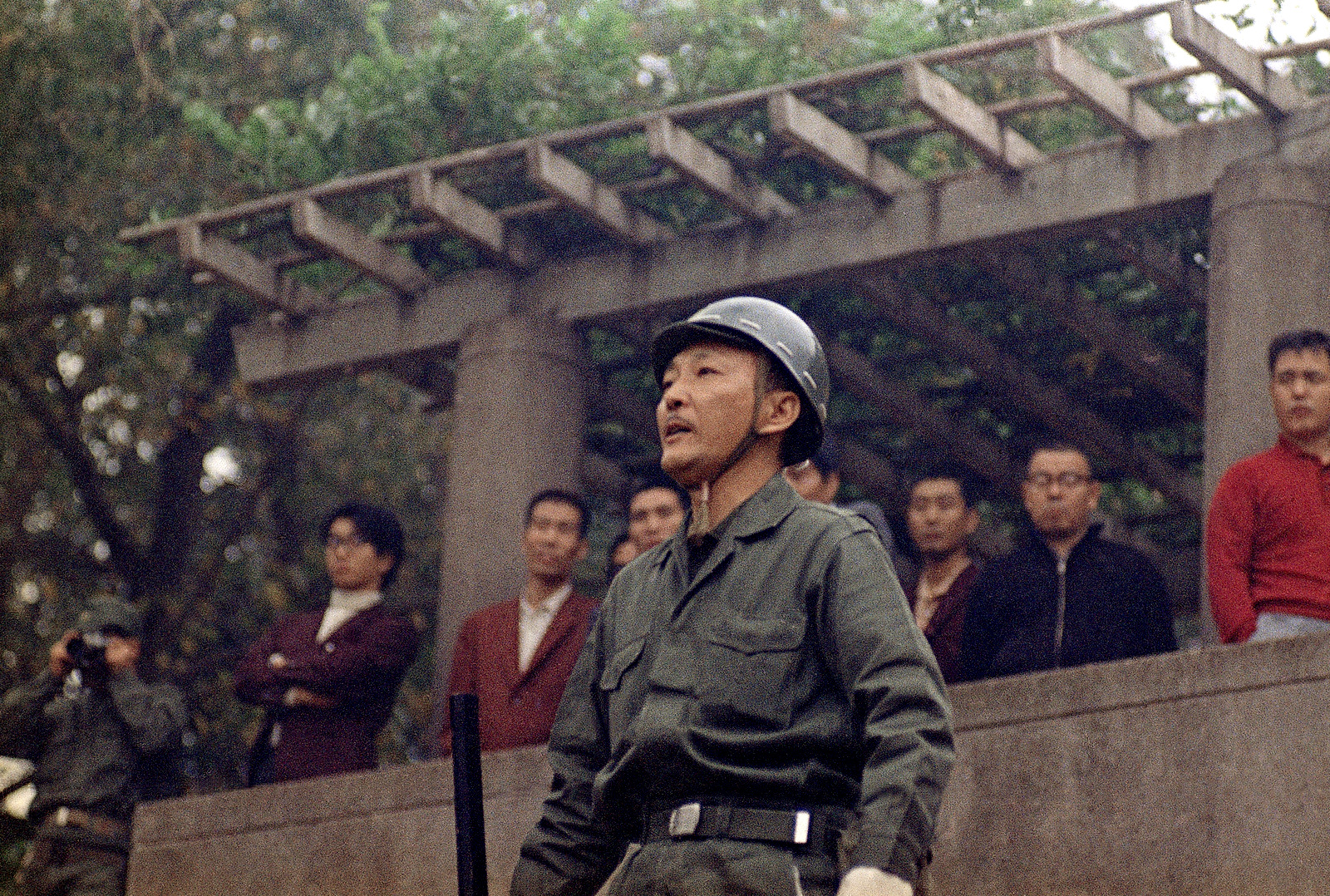 Yoshio Kodama, head of the rightist “Zenai Kaigi” association, inspects volunteer militia in Tokyo, Japan in this April 11, 1969 photo. Declassified CIA records, released in January 2007 by the U.S. National Archives and obtained by The Associated Press, document more fully than ever how suspected Japanese war criminals joined intelligence missions funded or otherwise supported by the Americans during the early days of the Cold War. (AP Photo)