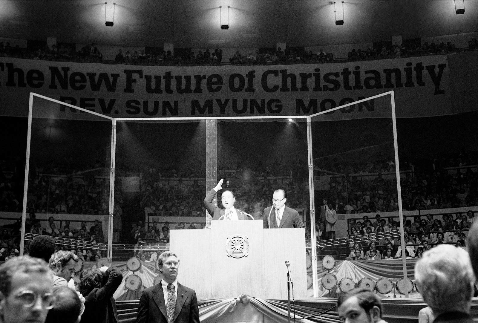 The Rev. Sun Myung Moon preaches to a capacity crowd of 20,000 on Sept. 18, 1974 in New York’s Madison Square Garden. The elaborately promoted Korean Evangelist proclaims a “New Truth” in which Jesus will come again as the third Adam and will take a bride. (AP/RP)