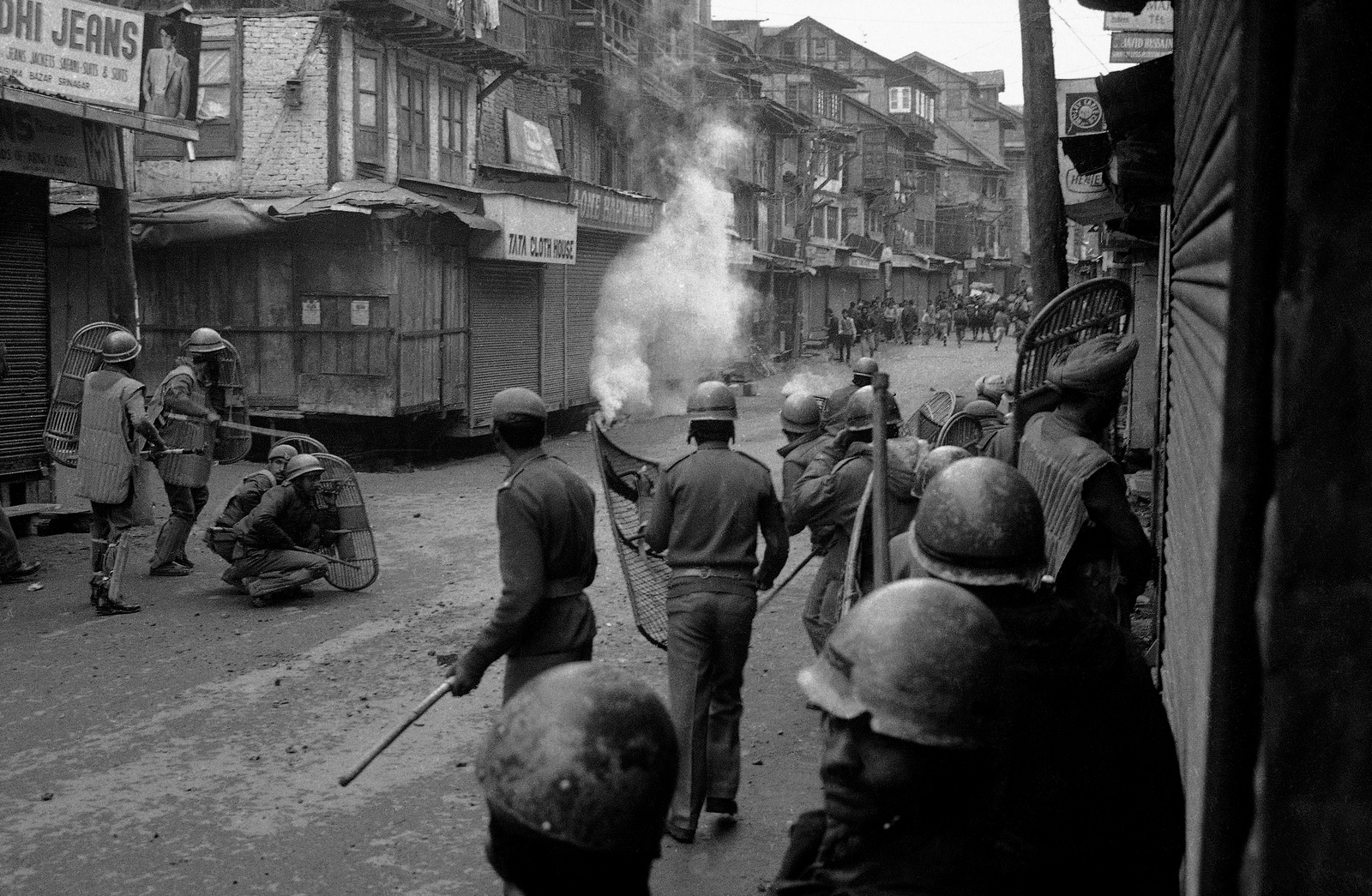 Indian security forces fire tear gas into a crowd of Kashmiri protesters, Feb. 6, 1990 in Srinagar, Kashmir. (AP Photo)