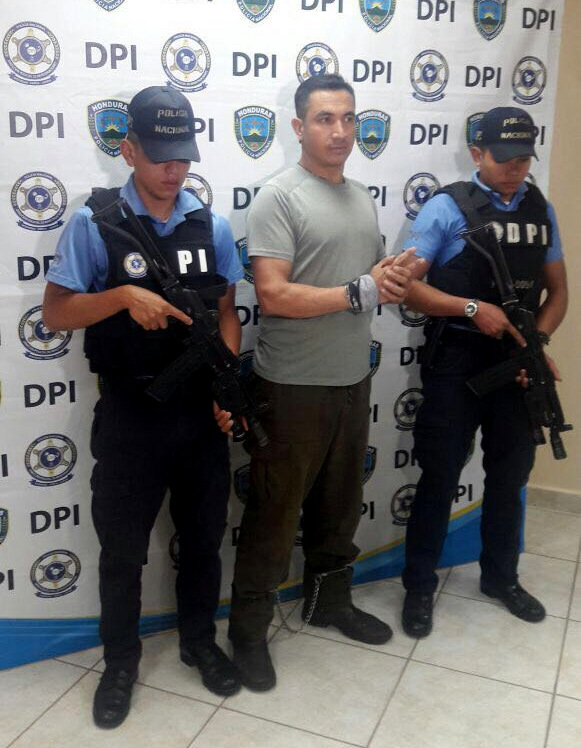 Edwin Robelo Espinal paraded in front of the media upon his arrest by Honduran police. Jan. 19, 2018.
